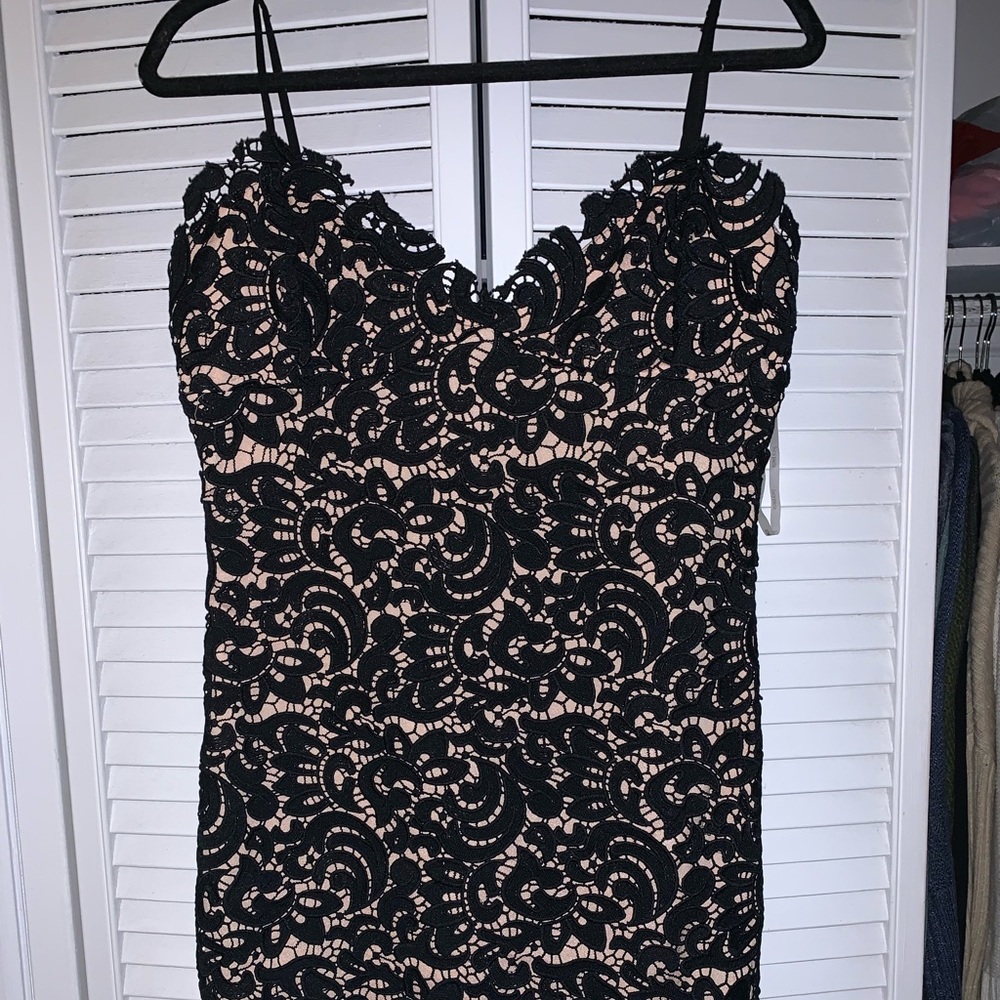 Lucy Paris black laced with nude lining dress